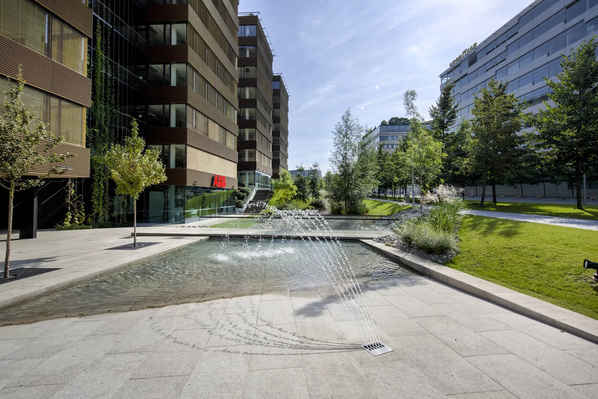 Fountain and gardens between the Delta office buildings